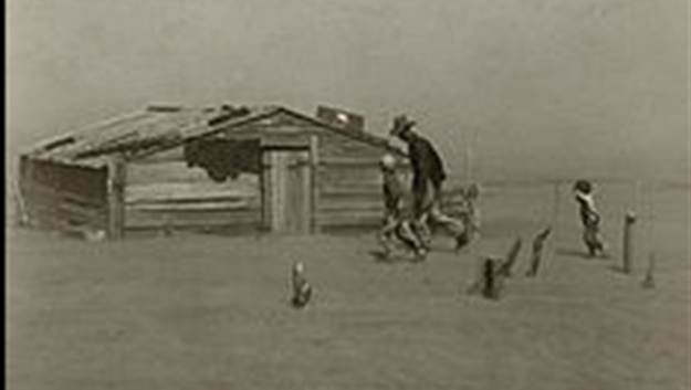 A person and child playing in the desert
Description automatically generated